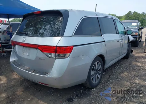 2014 Honda Odyssey Touring/Touring Elite z USA, uszkodzony, nr VIN 5FNRL5H97EB054158